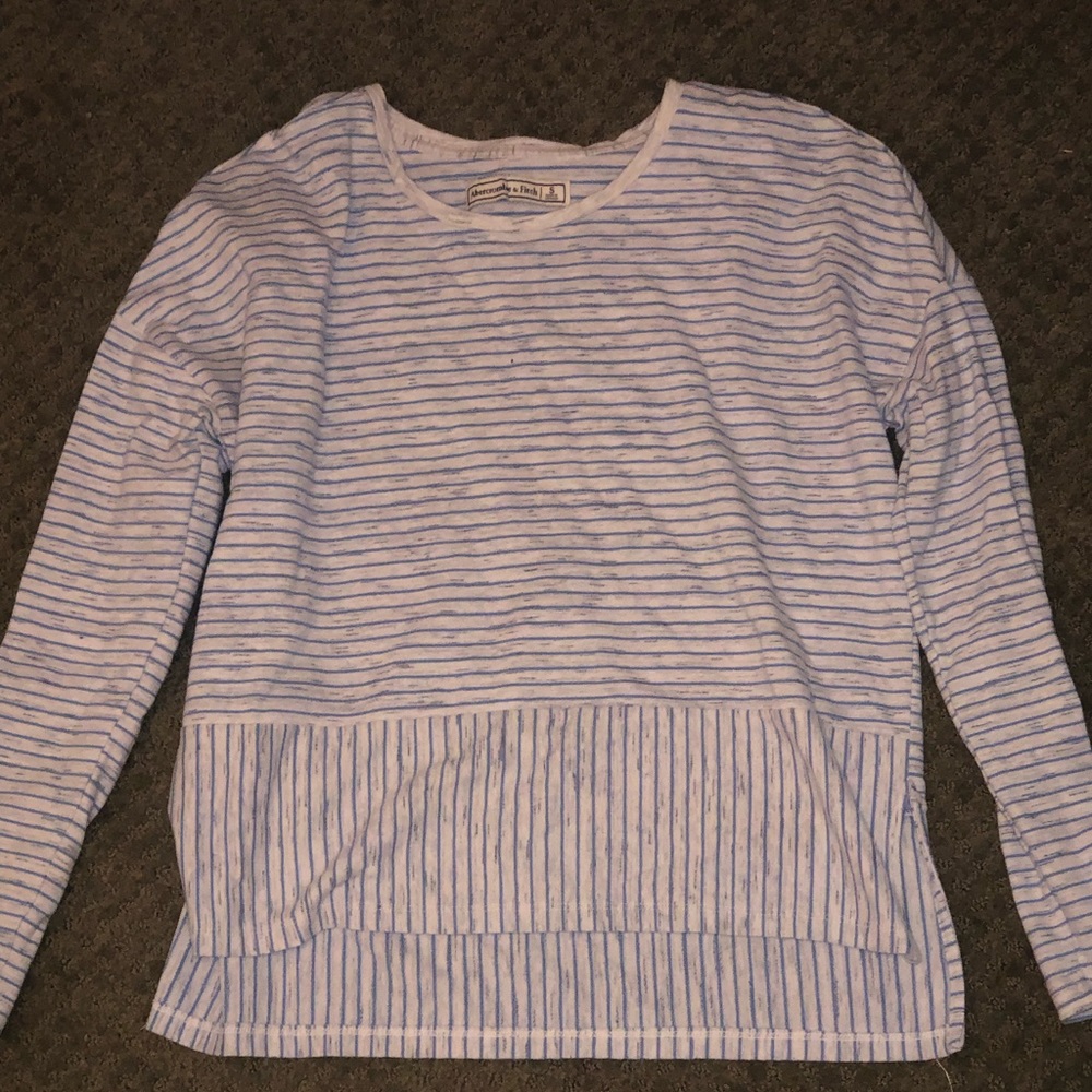 Striped pullover over long sleeves